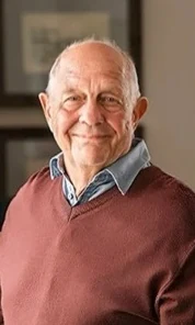 Photo 1: a grandfather in a red jumper.