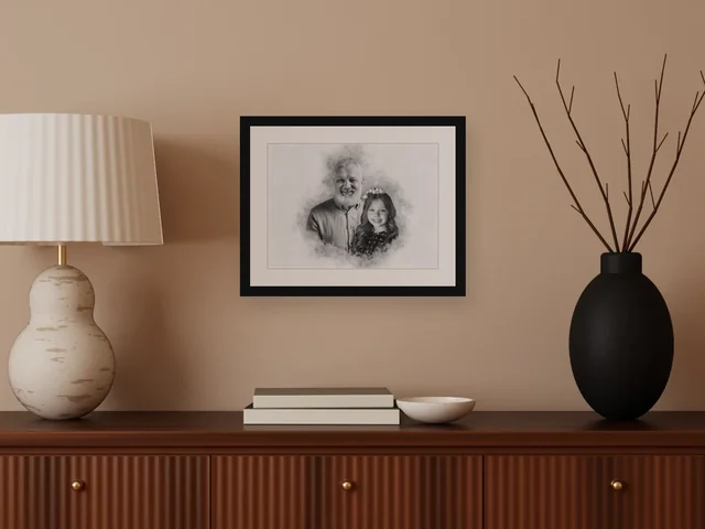 The graphite portrait framed in black above a sideboard.